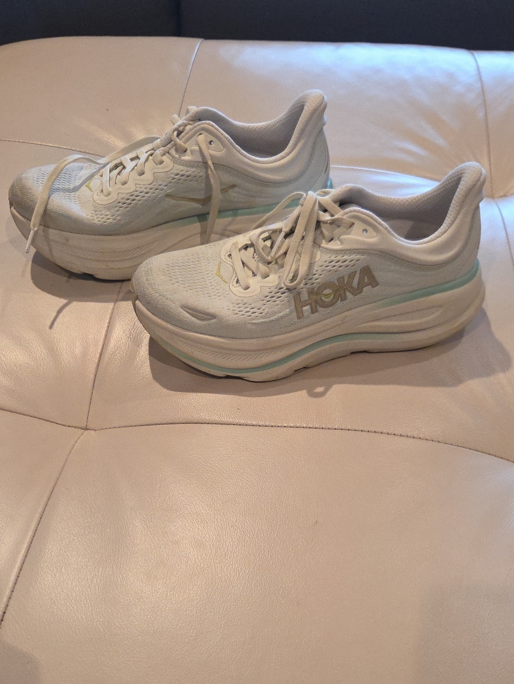 Hoka Women’s White Sneakers with Light Blue Accents. BONDI edition